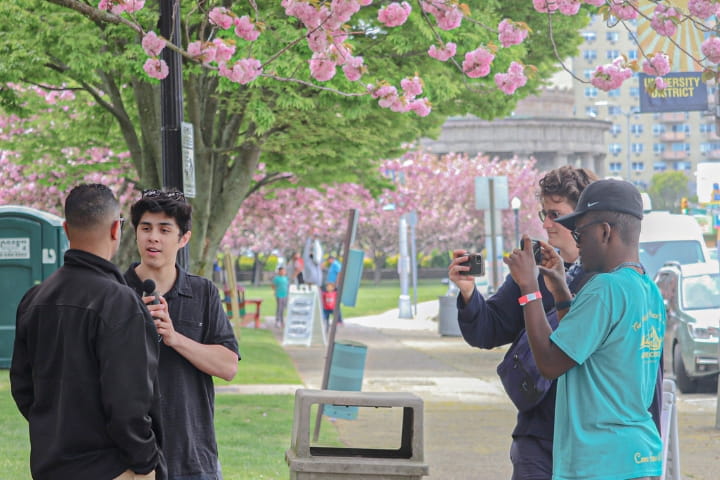 students interviewing Brian Jackson.