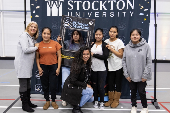 Attendees at photobooth during Latino Visitation Day.