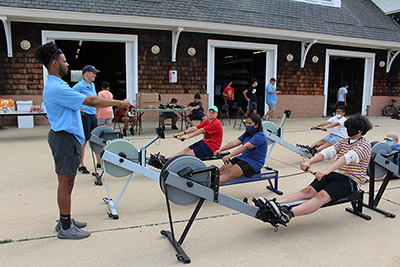 kids practicing on rowing machines
