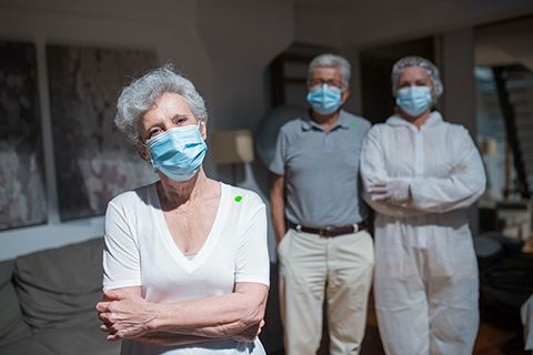 Stock photo of an older adult with a mask