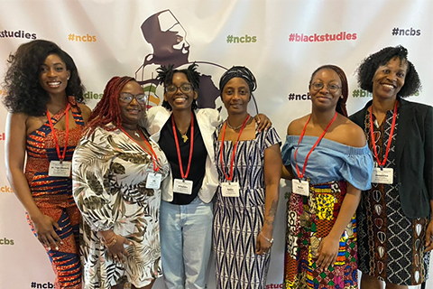 From left to right, students Krisandra Bagaloo, Rachel Dunlap, Keisha Richards and Lillian Nickens, with Donnetrice Allison, professor of Communication Studies and Africana Studies after their presentation.