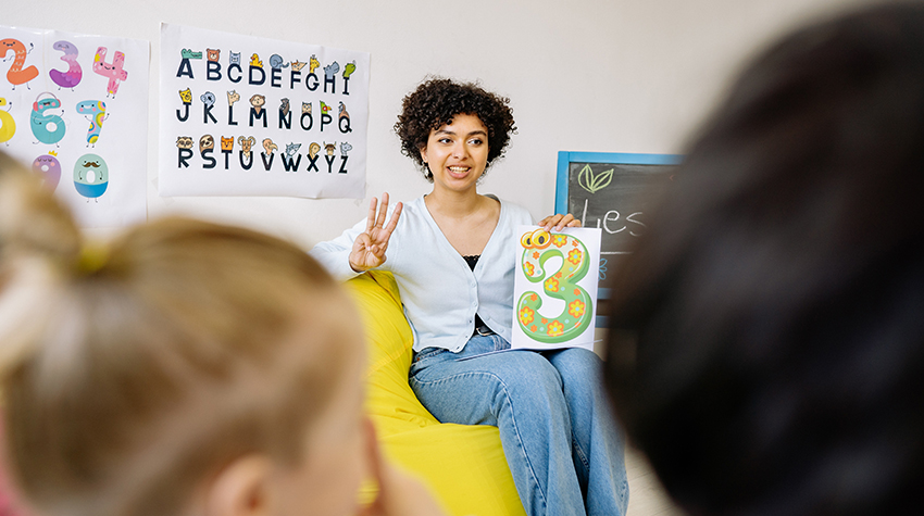 Stock image of a teacher giving a lesson