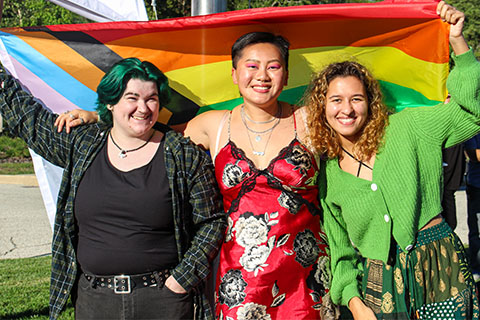 Mo Keane (center) during 2022's LGBTQ+ Flag Raising