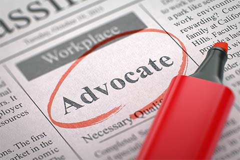 Stock image of a newspaper with the word "Advocate" circled