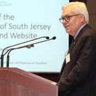 Photo of Dr. Hayse presenting Holocaust Survivors of South Jersey Project