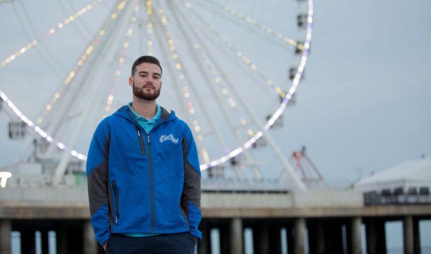 Matt DeCicco in front of Steel Pier - Standing on Beach Pier and Ferris Wheel in background