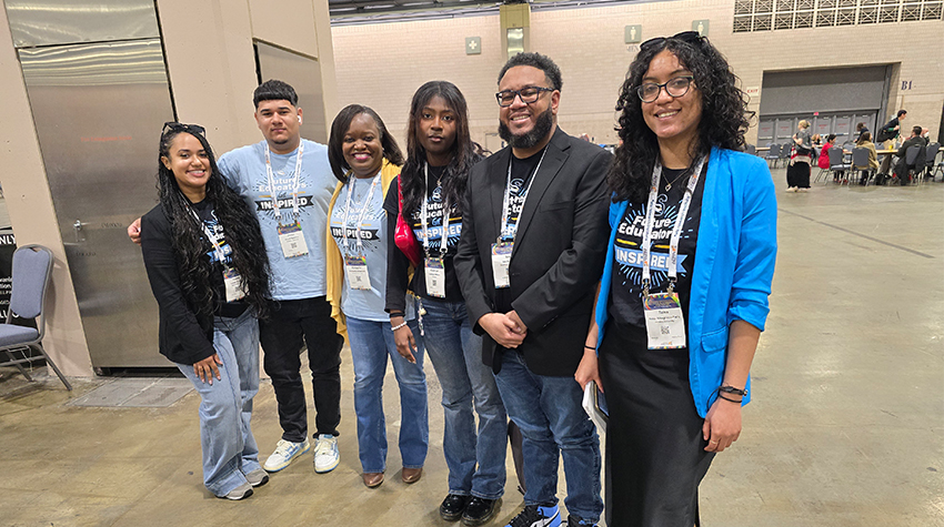 Dean Dickerson and students at the conference