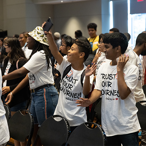 Students cheering on keynote speaker for GOALS/GEAR UP conference