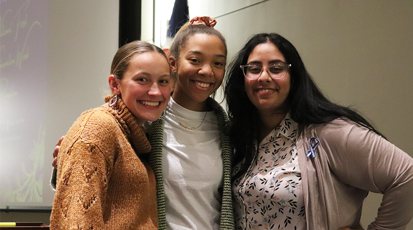 Jayne Seitz, Tamara Farrow and Priya Parikh of First Ospreys getting ready to pin other first-gen students for the ceremony.