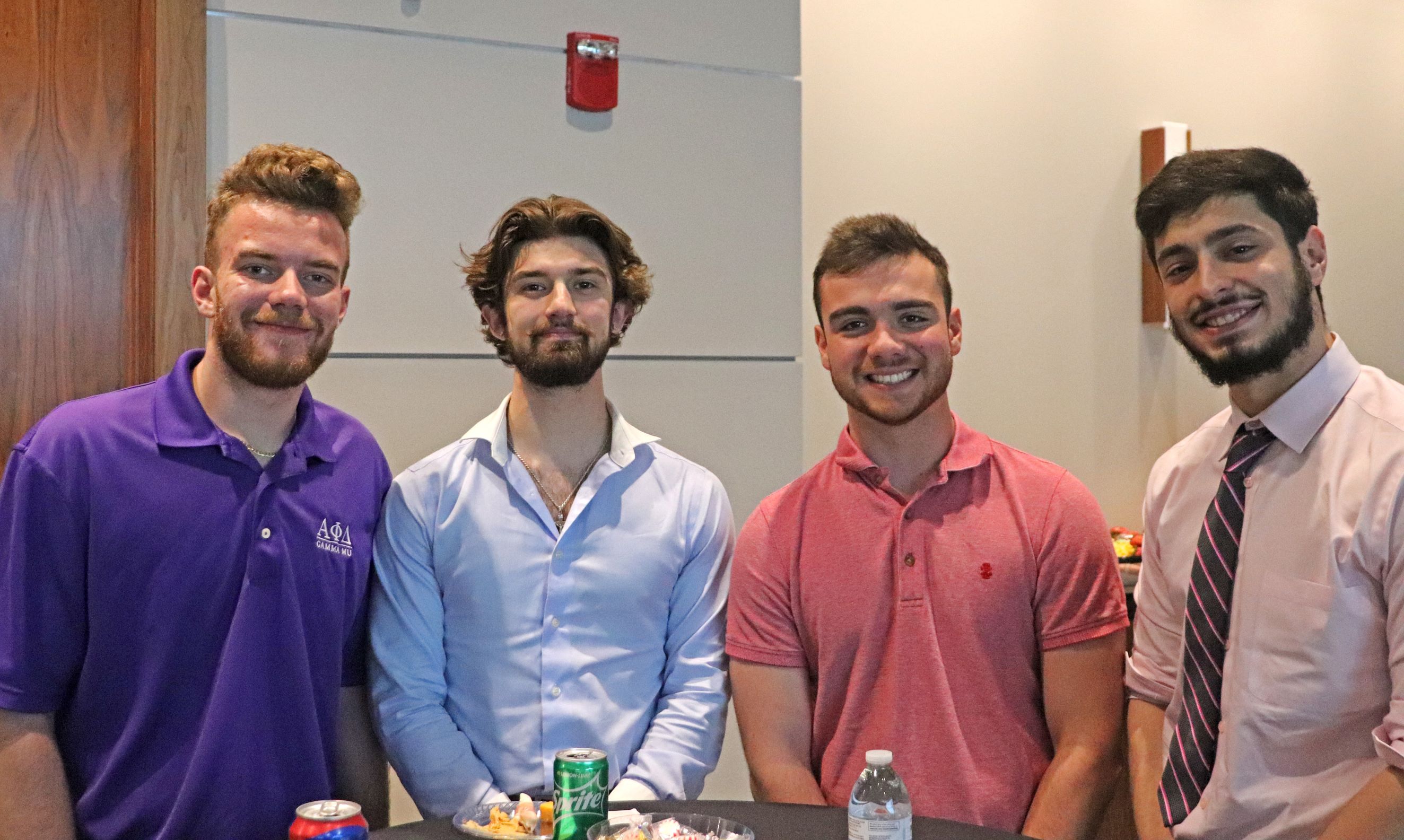 Junior Trevor Bunero, a Business Studies/Marketing major who hopes to begin crafting his personal brand with tips he picked up at the workshops, stands with friends at the Young Leaders Expo.