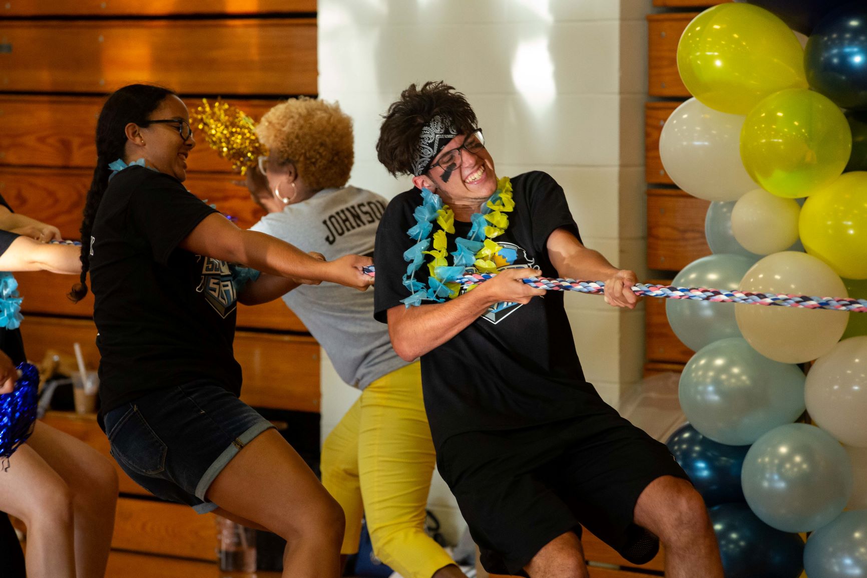 New students compete in tug of war at the Summer Slam event during Stockton University's overnight orientation experience called Nest Fest.
