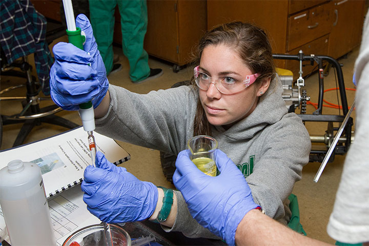 This student is making biofuel from waste materials that will be used to power an experimental go-kart.