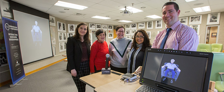 The photo above highlights a new program at the Sara and Sam Schoffer Holocaust Resource Center that will give area middle and high school students the opportunity to learn from a Holocaust survivor through engaging with an interactive survivor biography.  