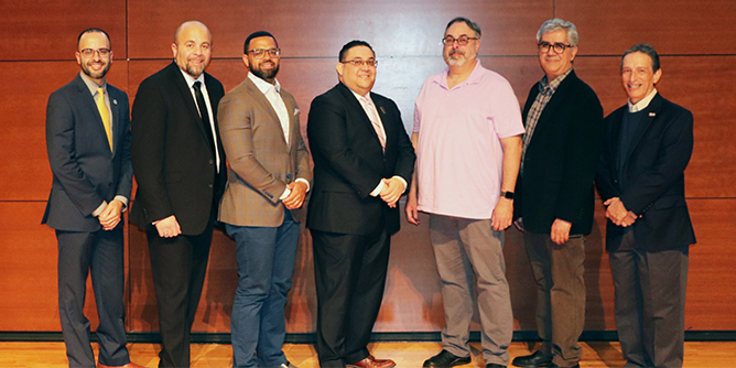 The "Many Caras (Faces) of Manhood" panelists (from left to right): Angel Hernandez, Pedro Santana, Israel Laguer, Alexis Delgado, Luis Garcia, Michael Rodriguez and Arnaldo Cordero-Roman.