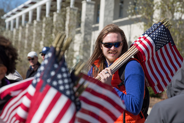 man holding flag