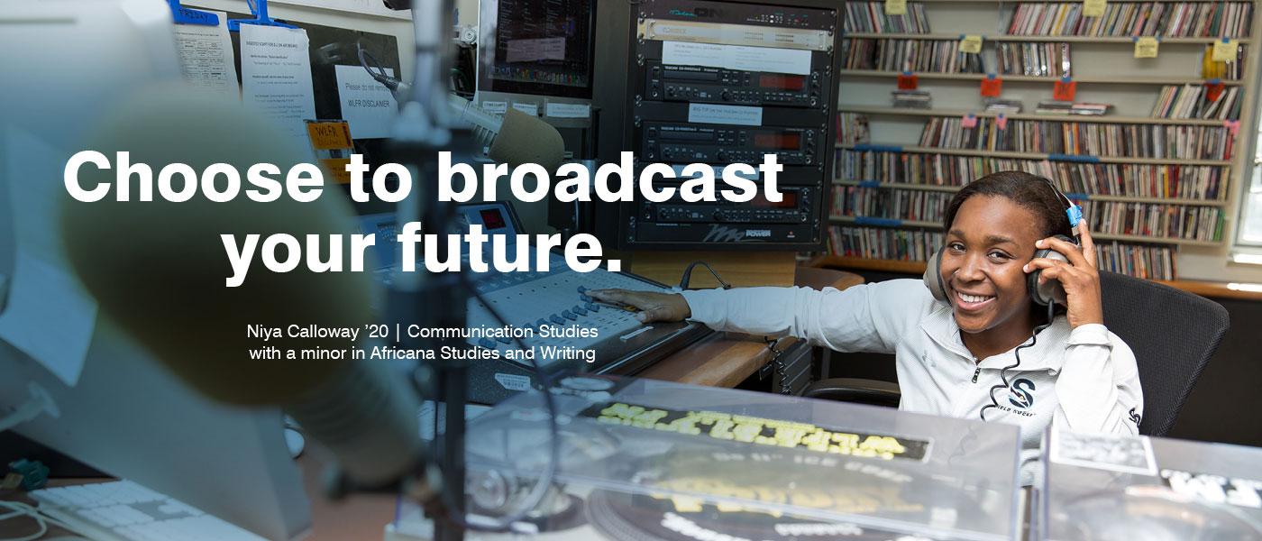 girl smiling using radio broadcast controls 