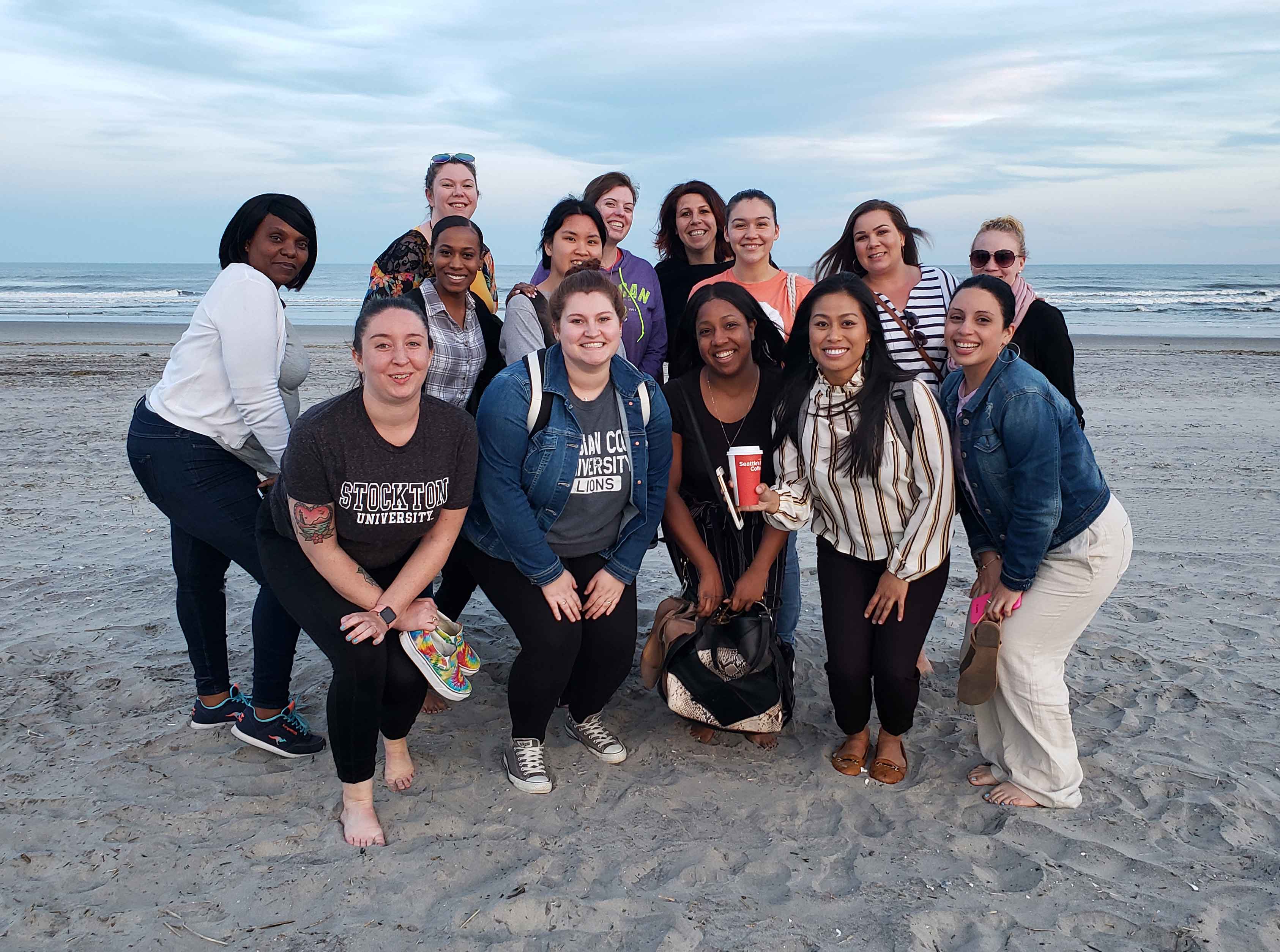 MSW Grad students smiling on beach