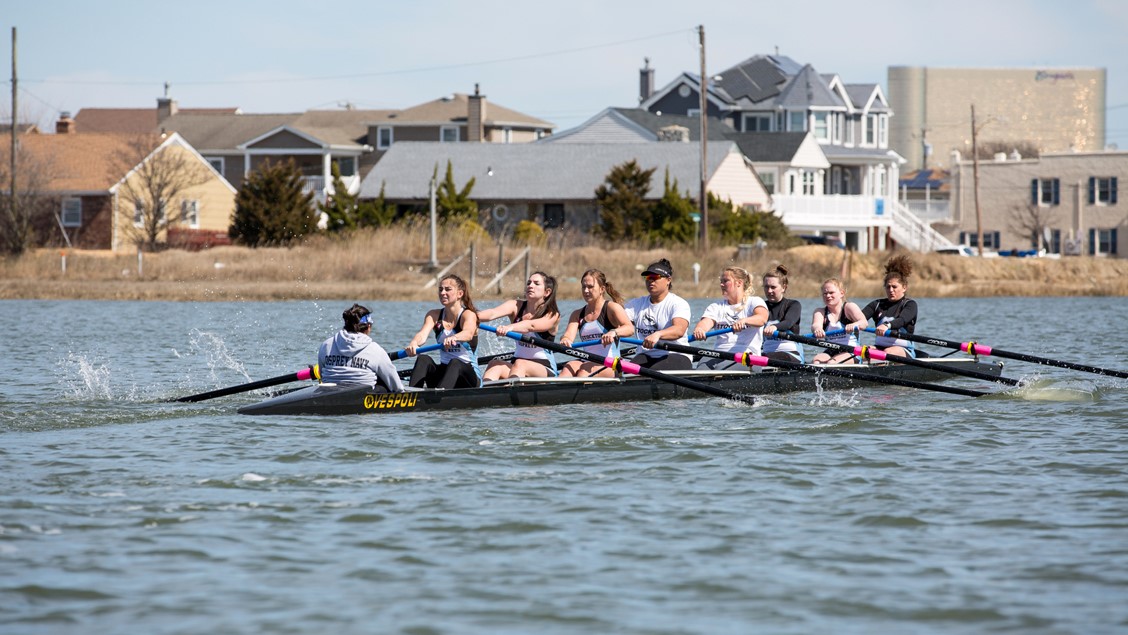 women rowing