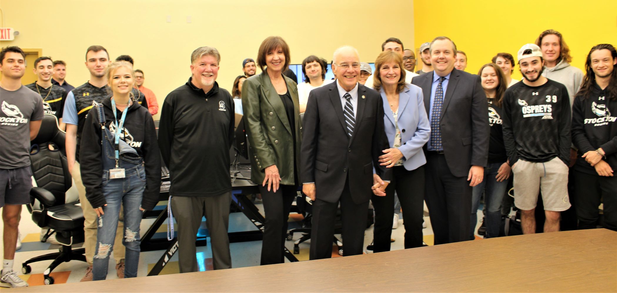 Stockton President Harvey Kesselman and Lynne Kesselman, center with members of Stockton’s club and intramural sports teams, Athletic Director Anthony Berich, Stockton Foundation Chair Donna Buzby and Chief Development Officer Dan Nugent.