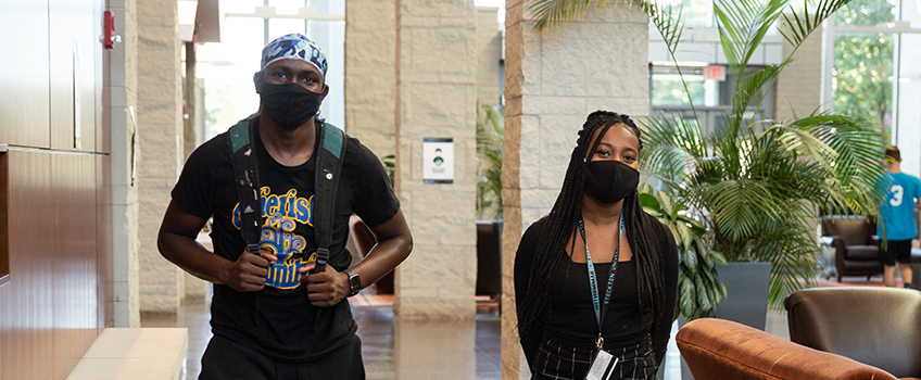 two students wearing masks