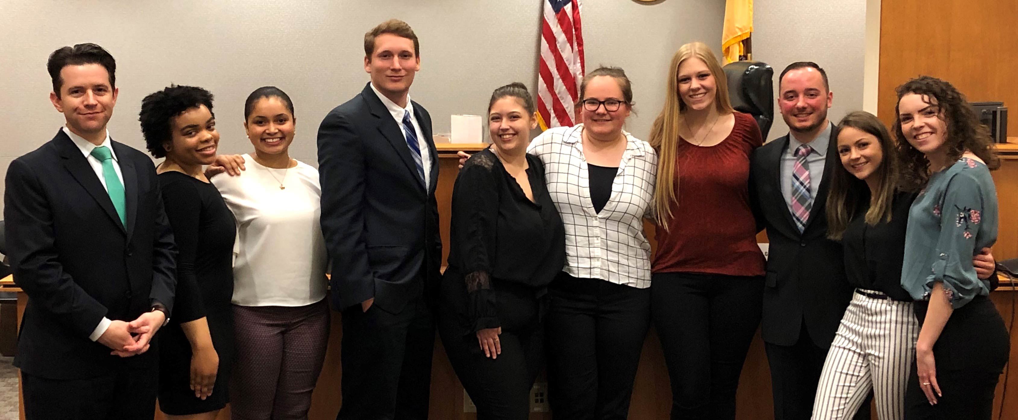 From left, Rick McKelvey, adjunct instructor of Criminal Justice at Stockton University, with students Camara Wimbush, Yomaris Acosta, Matthew Epstein, Alexis Motika, Paige Jardin, Elizabeth Hartka-Winkelspecht, Daniel Rossi, Michele Monteserin and Christina Michael.