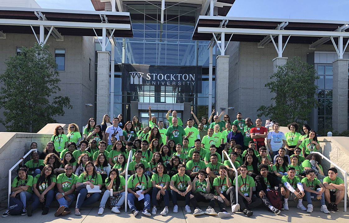 Students and staff sitting outside of the Campus Center in 2019.