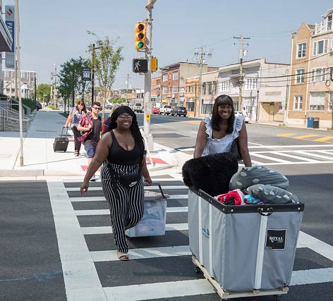 students crossing crosswalk 