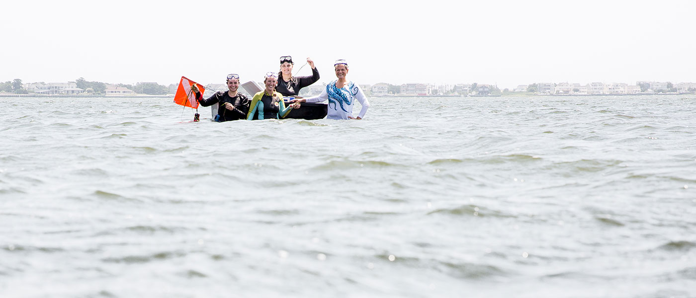 four women in ocean 