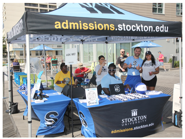 stockton staff at admissions table on boardwalk