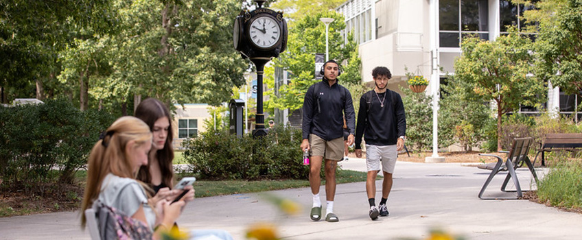 students walking on campus