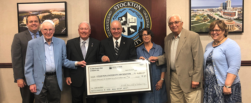 From Left, Stockton Chief Development Officer Dan Nugent, Jerry Greenberg, Jim Goldsmith, Stockton President Harvey Kesselman, Stockton Foundation Chairwoman Johanna Johnson, Tony Musarra and Stockton Chief of Staff Susan Davenport.