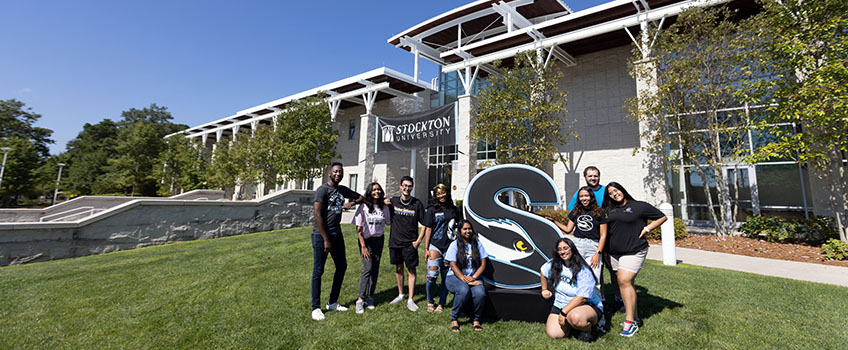 students around S sculpture