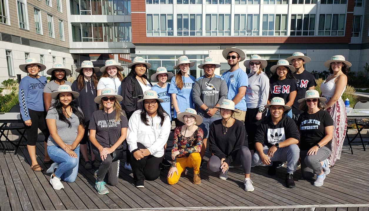 group of people on boardwalk 