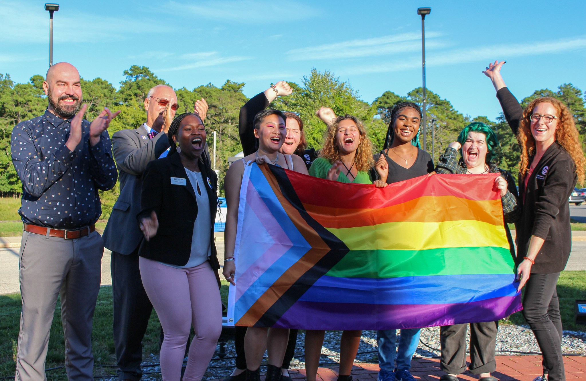 LGBTQ+flag-raising group 