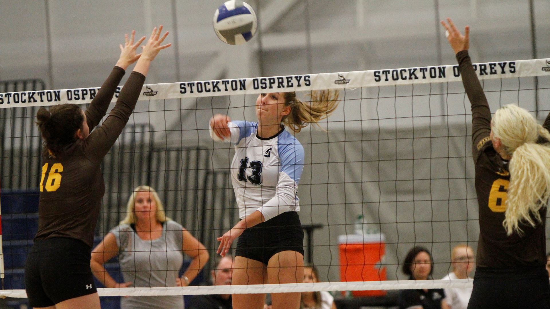 girl spiking volleyball 