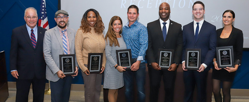 From left, President Harvey Kesselman with Daniel Tome, Tracy Thompson, Melissa and Lucas McCooley, Terry King, Carl Archut, Jr. and Danielle Corso