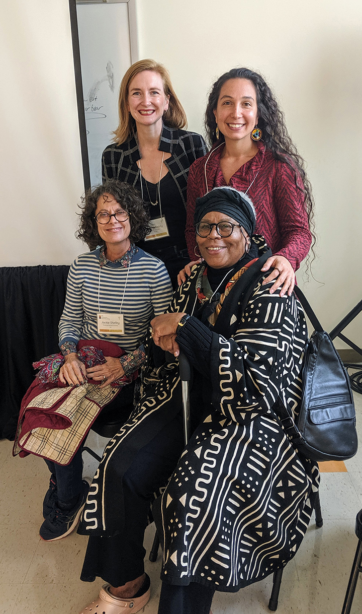 Nancy Reddy, left, with Emari DiGiorgio, standing behind Jackie Shelly, left, and Belinda Manning, both seated.