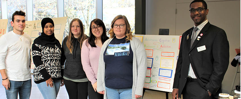 Associate Professor of Nursing Larider Ruffin, right, with students, shared their projects to raise awareness of the impact of smoking and vaping.