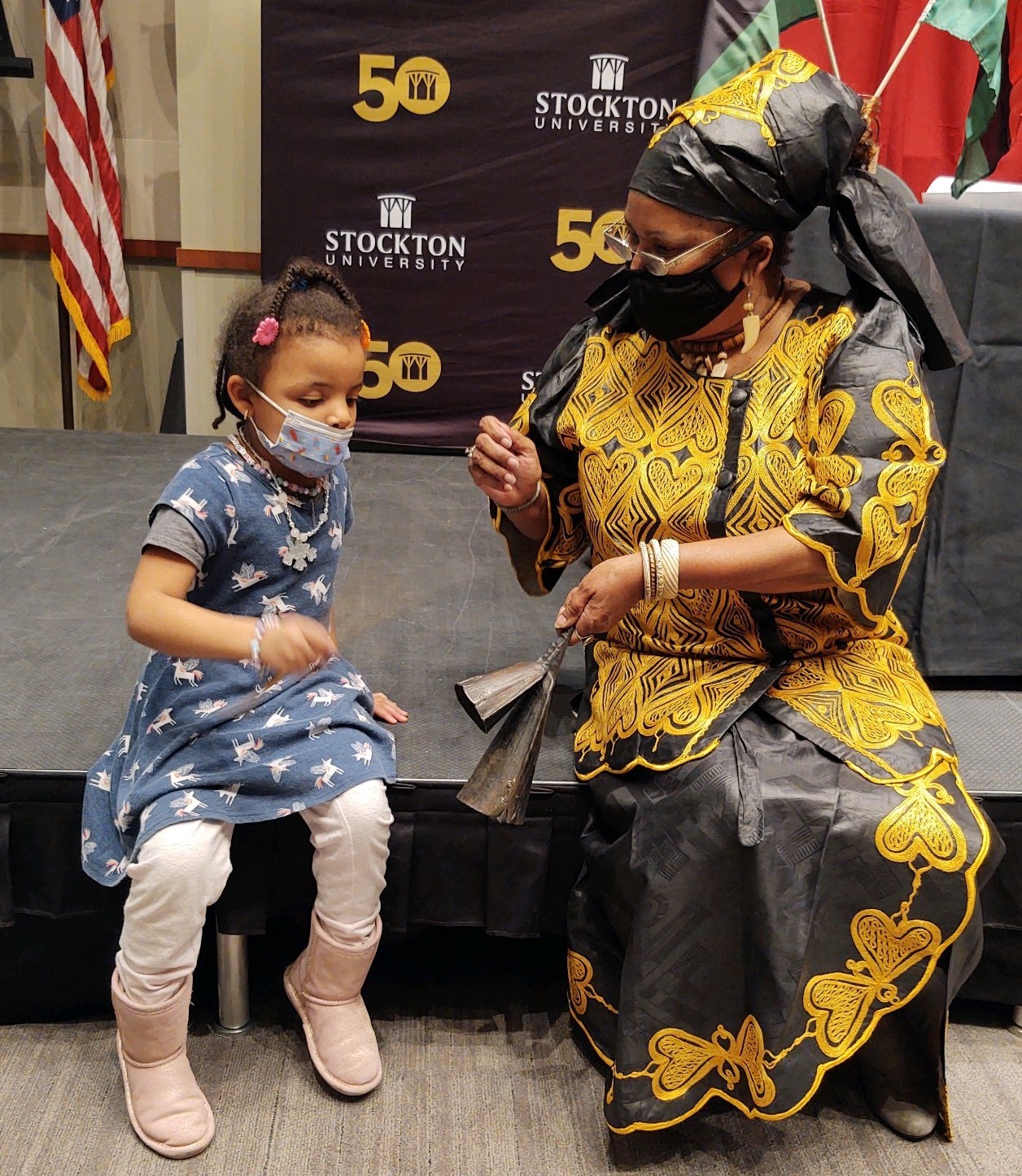 Patricia Reid-Merrit, Distinguished Professor of Africana Studies and Social Work and program coordinator, teaches four-year-old Jayla (Donaldson) Grasty