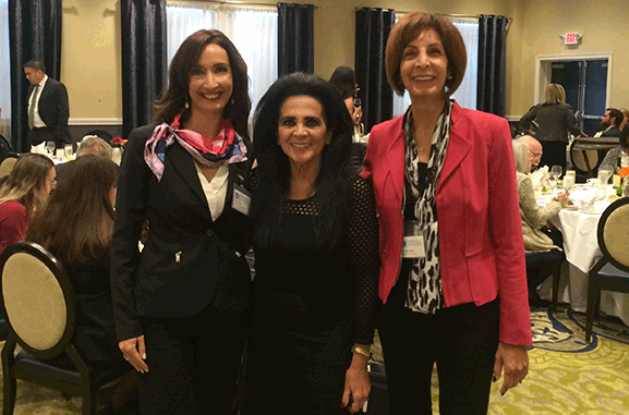 Three women smiling 