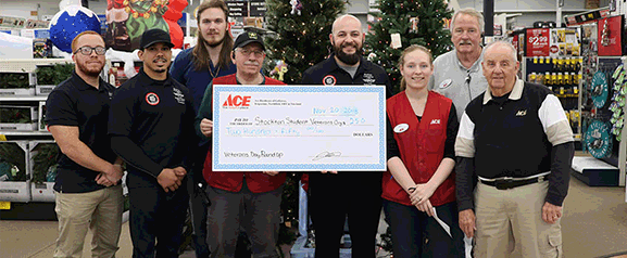 From left: Angel Cordero, vice president of the Student Veterans Organization; Tobias Chislom, SVO treasurer; Colby Jones, SVO member; Lou Abate, ACE employee and retired National Guard; Ryan Luurtsema, SVO president; Kelly O’Brien, Stockton alumna and ACE employee; Ed Peak, store manager; and Bill Pitt, ACE employee and retired Navy.