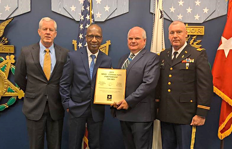 Colonel Mike Lyons of the NJDMAVA, Tait Chirenje, professor of Environmental Science at Stockton; Chuck Appleby, chief of Environmental Management Branch at NJDMAVA; and Don Hilderbrant, chief warrant officer of the NJDMAVA.