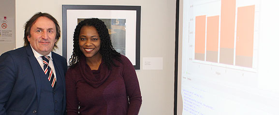 Professor J. Russel Manson and student Keiana Dunn at the Open House for the Master of Science in Data Science and Strategic Analytics program at Kramer Hall in Hammonton