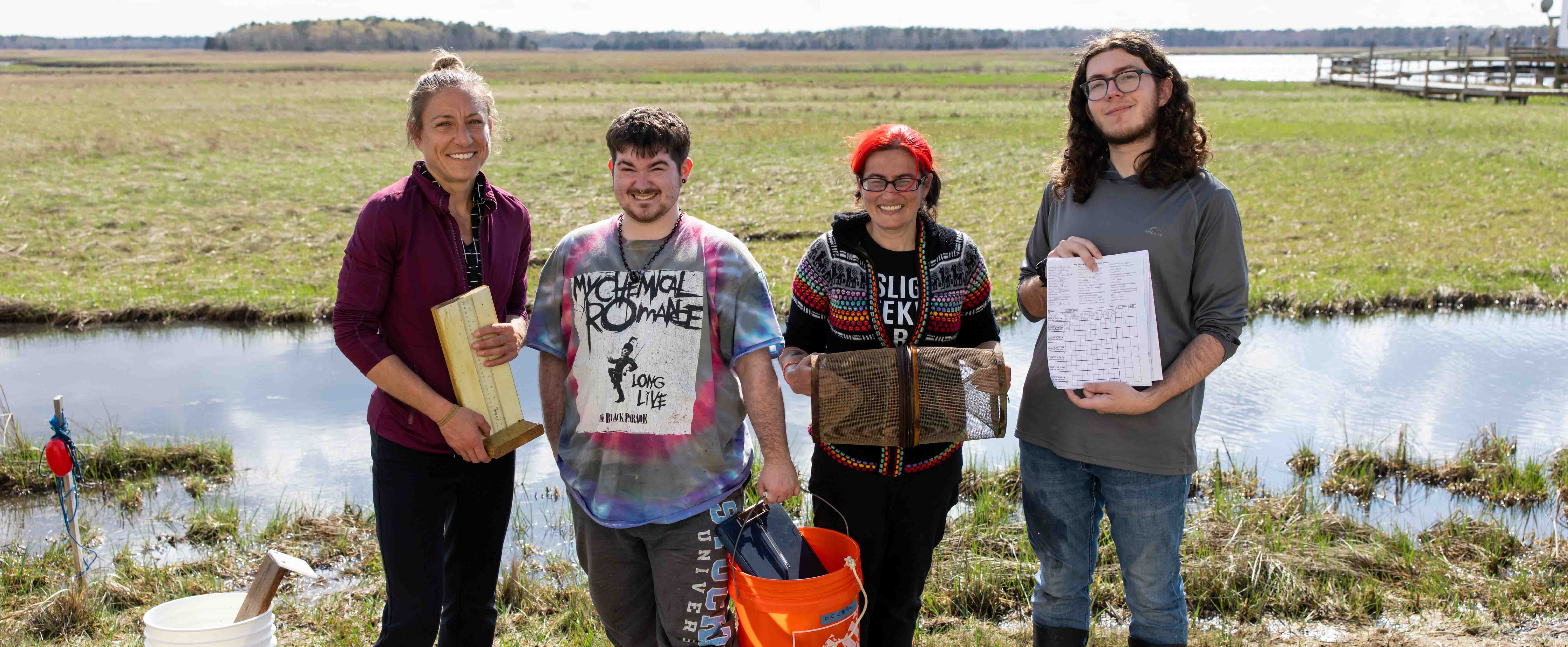 fish study participants at a marsh
