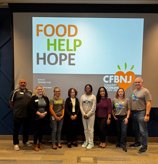 food donation people standing smiling