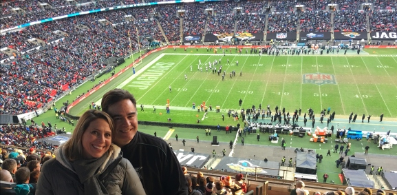 Brian Kowalski and Margo Ahart smiling at Wembley Stadium