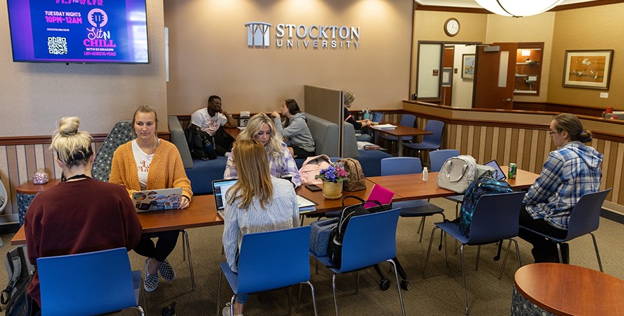 students sitting around table