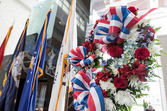 patriotic wreath and flags in background