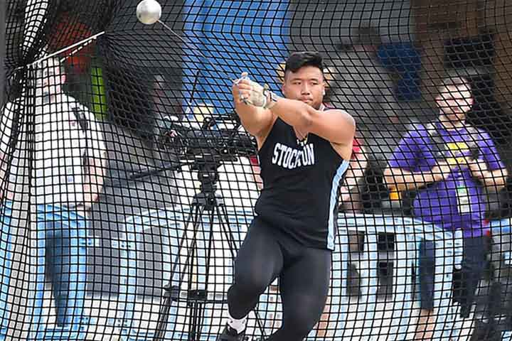 Darren Wan competing in the Hammer Throw