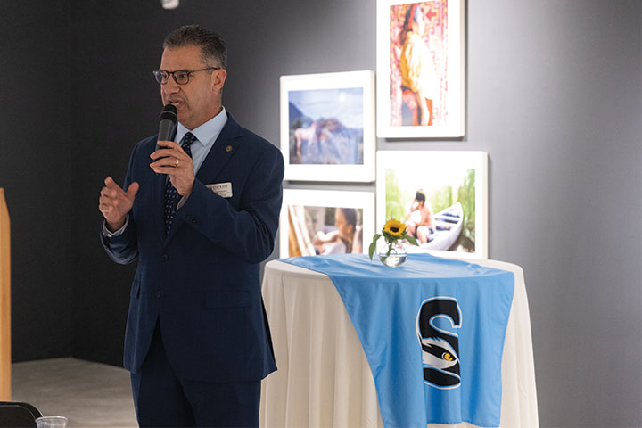 Michael Palladino speaking in the Art Gallery